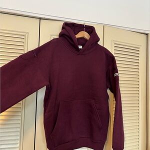 Comfrt Travel Essentials Hoodie Sweatshirt Plum Berry Unisex XS. NWOT.